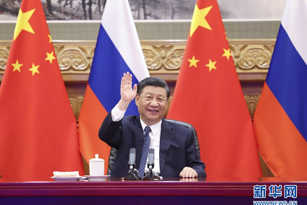 习近平同俄罗斯总统普京共同见证中俄核能合作项目开工仪式