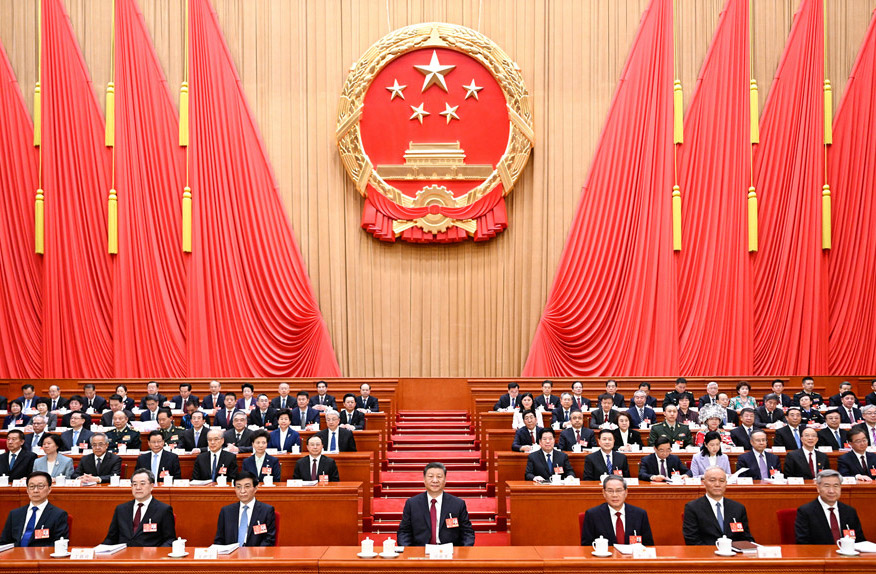 十四届全国人大三次会议在京开幕 习近平等在主席台就座