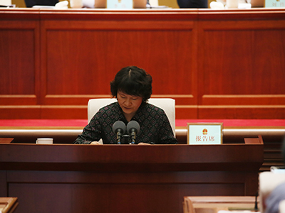 听取市人大法制委员会关于《北京市街道办事处条例(草案)》审议结果的报告